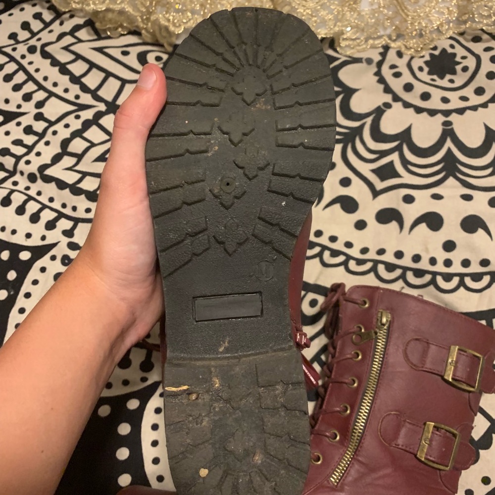 Maroon combat boots with gold zipper on the side. - Picture 2 of 4